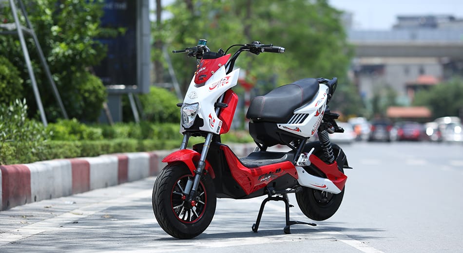 XE MÁY ĐIỆN XMEN HAI GIẢM XÓC